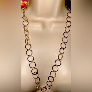 NWT Silver and Gold Toned Long Hoop Necklace. 27"